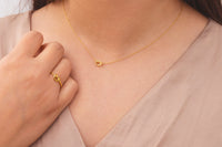 Collar con colgante de nudo de amor en forma de corazón