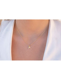 Collar con colgantes en forma de rayo con circonitas y estrella