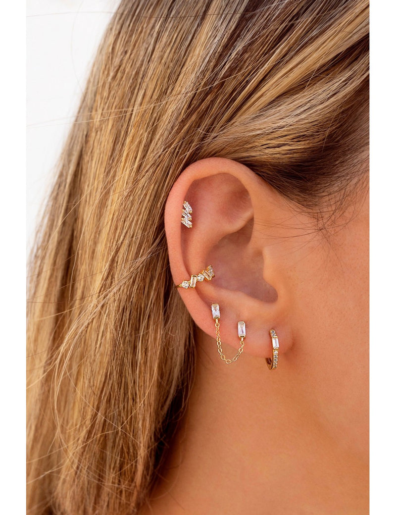 Pendientes stud piercing doble de circonitas en talla baguette con cadena