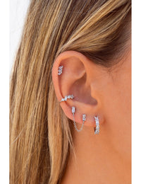 Pendientes stud piercing doble de circonitas en talla baguette con cadena