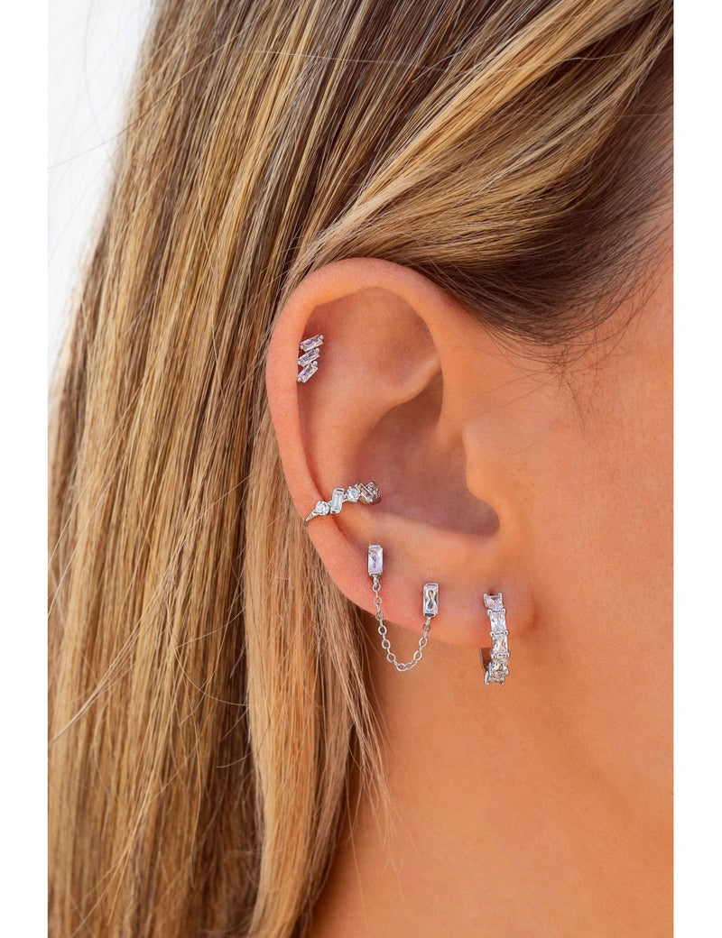 Pendientes stud piercing doble de circonitas en talla baguette con cadena