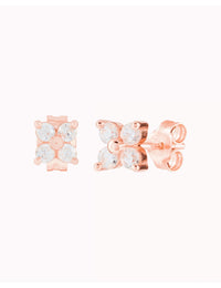 Pendientes stud pequeños en forma de flor con circonitas