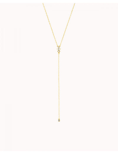 Collar largo en forma de Y con circonitas baguette y redonda