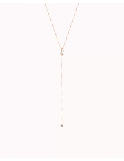 Collar largo en forma de Y con circonitas baguette y redonda