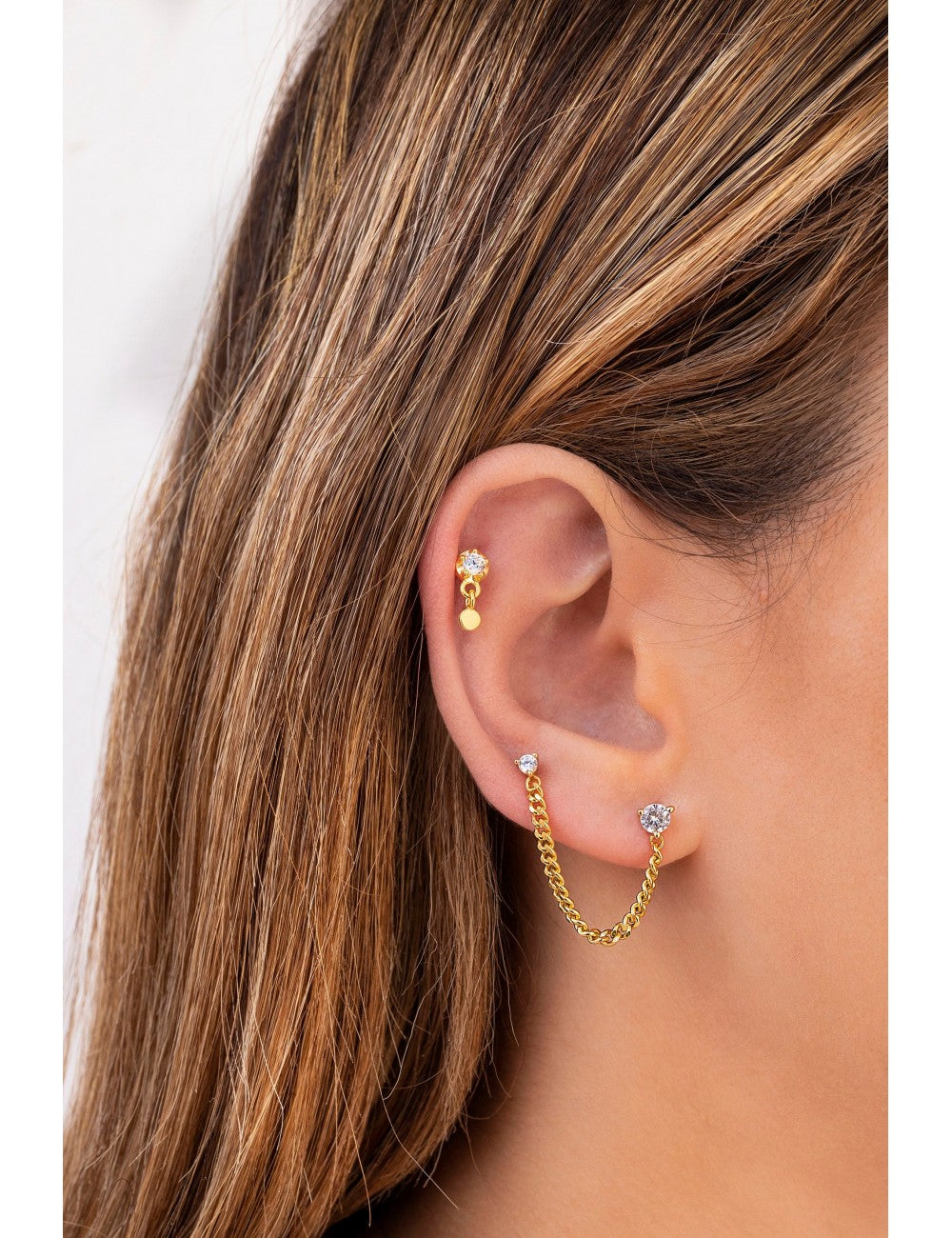 Pendientes stud piercing doble de circonitas con cadena barbada