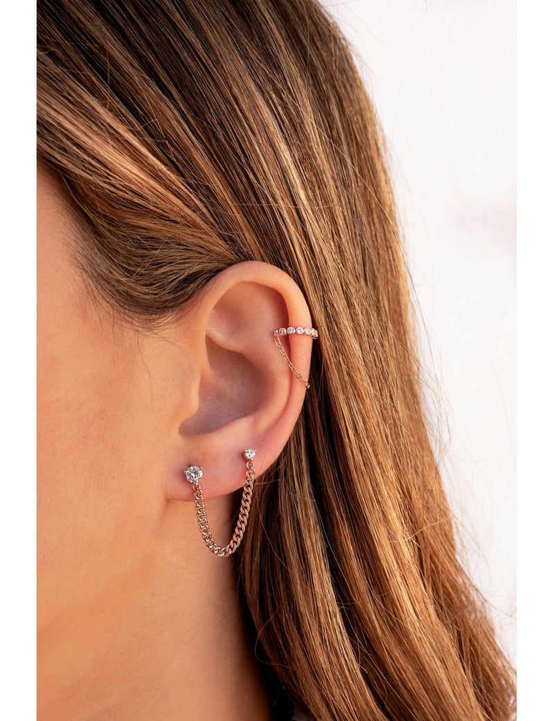 Pendientes stud piercing doble de circonitas con cadena barbada