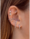Pendientes stud de circonitas con 2 charms ovalados y circonitas en pavé